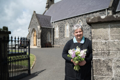 Alison of Beechfield Flower Farm holds a bouquet of freshly cut locally grown British flowers for British Flowers week 2021