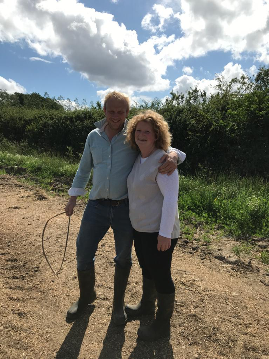 Carolyn Deeley of Pembridge Farm stands on her British cut flower farm with her partner.