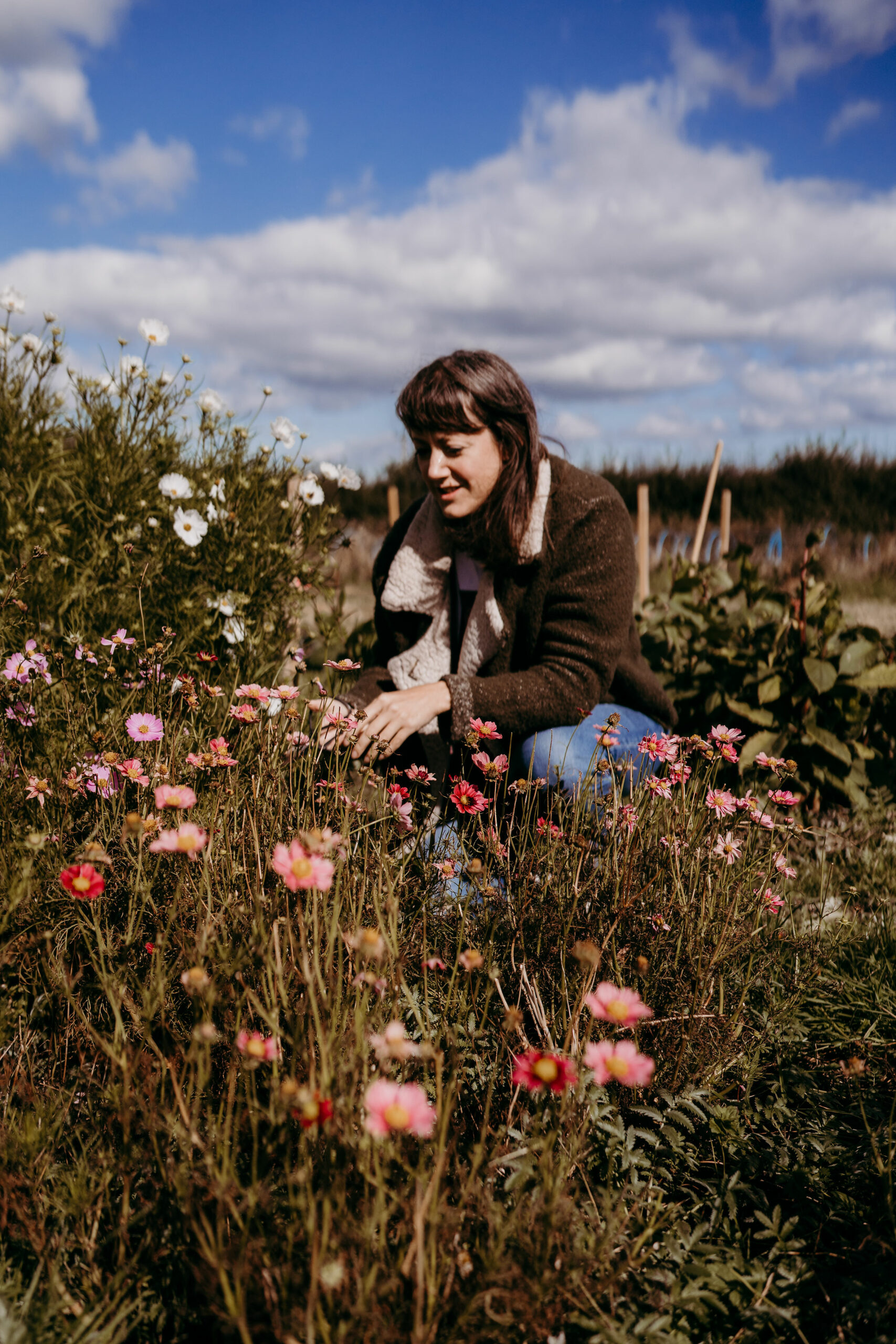 Lucy Marshall of Deadhead Flower Farm amongst the flowers on her plot