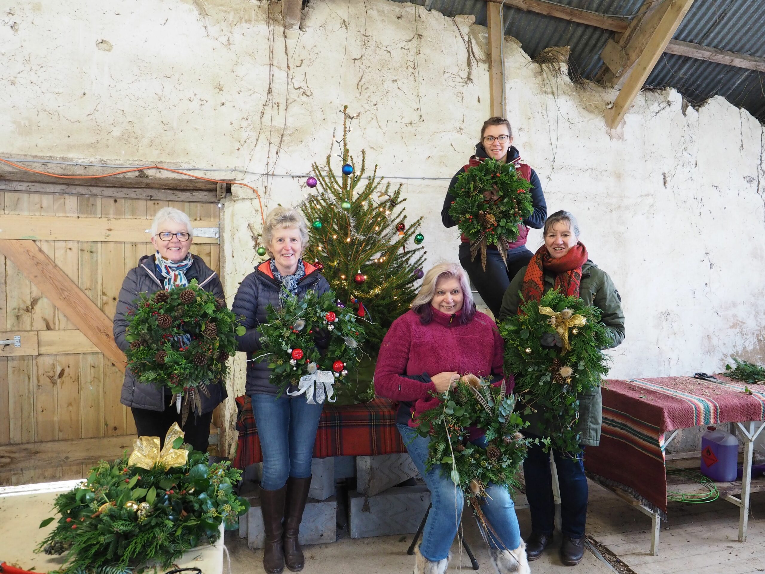 Smiles all round at a festive wreath workshop run by Sarah Hill