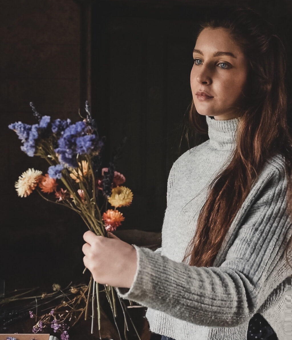 Becky Fraser of RJF Flowers arranging with dried flowers from her plot