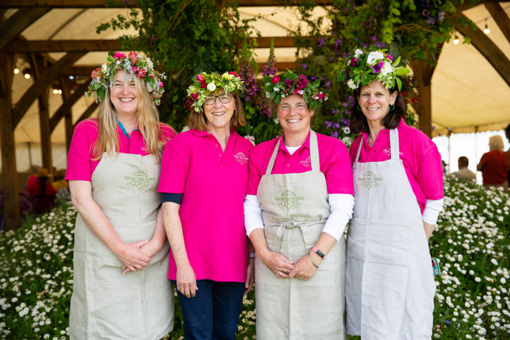 Members Nicola Hill, Ruth Woolacott, Sophie Hamilton and Kat Norbury wearing fabulous flower crowns at the RHS Malvern Spring Festival