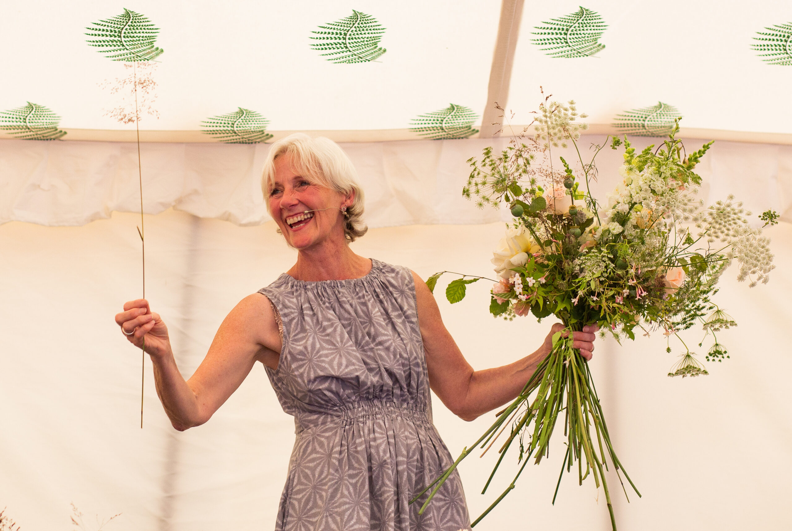 Leigh Chappell demonstrating a hand-tied bouquet at the RHS Flower School at Hampton Court