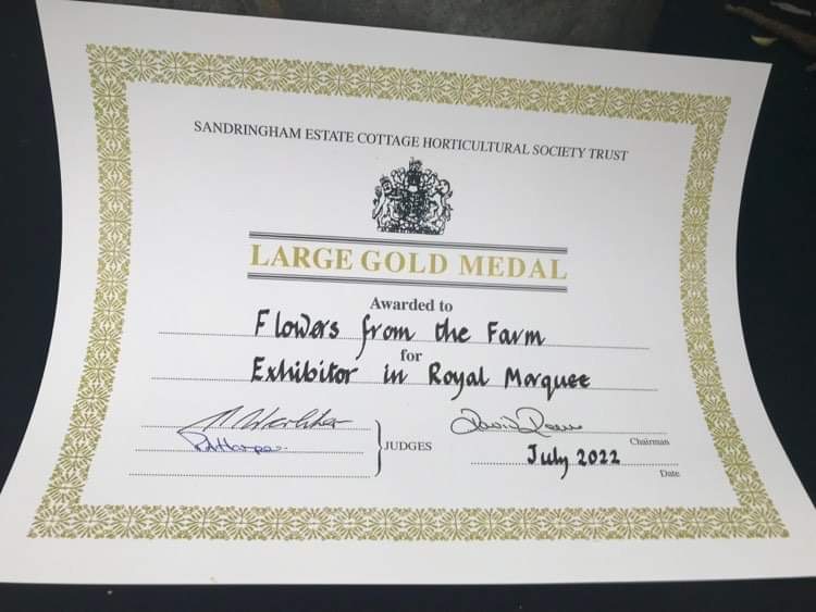 A certificate for the Large Gold Medal awarded to Flowers from the Farm for their display at the Sandringham Show in 2022