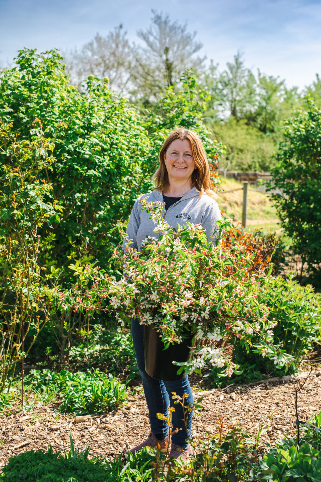 FFTF Co-chair Jo Wright of Organic Blooms gathers flowering foliage for the Coronation displays.