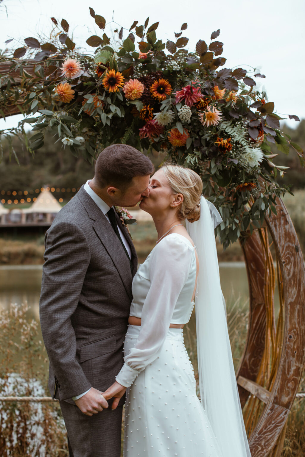 Holly Smith Weddings, couple by moongate by Kate Ladd Greenery Flowers