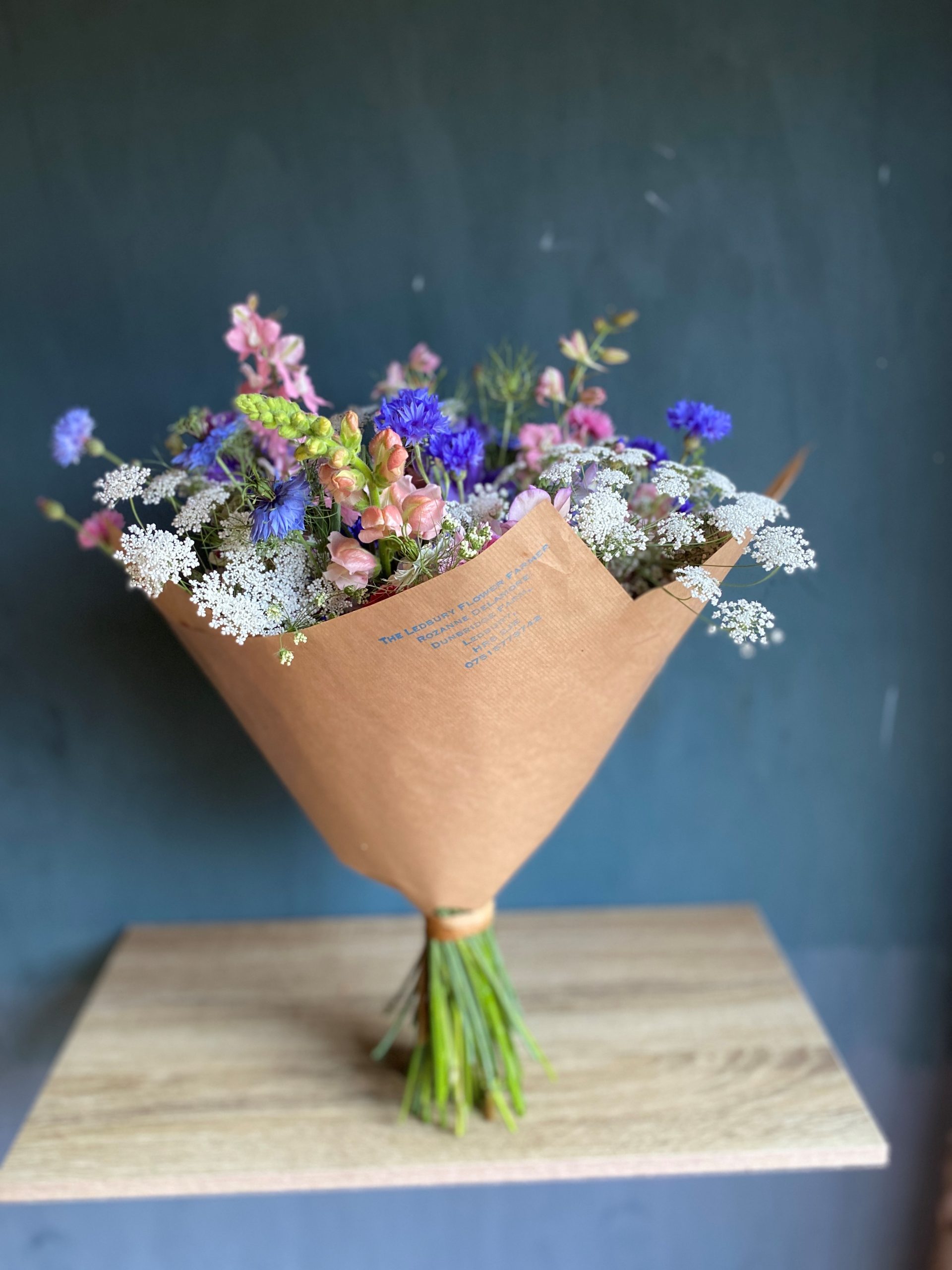 Create a hand tied bouquet with Rozanne Delamore